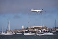 United Airline Plane flying above SF bay