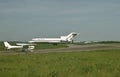 United Airlines Boeing B-727 and a Cessna 172 on a beautiful afternoon at Pittsburgh International Airport , Pennsylvania on May