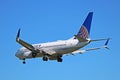 United Airlines Boeing 737-700 Flying By Royalty Free Stock Photo