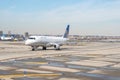 A United Airlines commuter jet operated by Republic prepares for take off at EWR Royalty Free Stock Photo