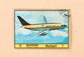 A stamp printed in the UAE shows an old airplane Boeing 737, circa 1980