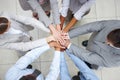 United as one - Business Teams. United colleages putting their hands together - Birds eye view. Royalty Free Stock Photo