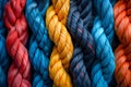 United Colors of Strength: Ropes Entwined in Collaboration. Concept Team Building, Rope Exercises, Royalty Free Stock Photo