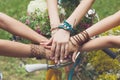 United hands of girlfriends closeup, young girls in boho bracelets Royalty Free Stock Photo