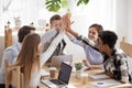 United happy multi-ethnic team give high five together share success Royalty Free Stock Photo