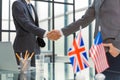 United Kingdom and American leaders shaking hands on a deal agreement. Royalty Free Stock Photo