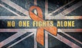 United Kingdom awareness concept. No one fights alone Childhood Cancer awareness month concept with great britain flag and orange