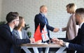 United Kingdom and Chinese leaders shaking hands on a deal agreement Royalty Free Stock Photo