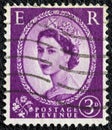 UNITED KINGDOM - CIRCA 1952: A postage stamp printed in United Kingdom shows a portrait of queen Elizabeth II, circa 1952. Royalty Free Stock Photo