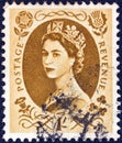 UNITED KINGDOM - CIRCA 1952: A stamp printed in United Kingdom shows a portrait of Queen Elizabeth II, circa 1952. Royalty Free Stock Photo