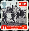 UNITED KINGDOM - CIRCA 1994: A stamp printed in United Kingdom shows commandos landing on gold beach, circa 1994.