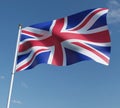 United Kingdom flag 3D illustration on blue sky background. 3D rendering illustrations Royalty Free Stock Photo