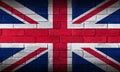 United Kingdom flag painted on brick wall background texture. National flag of United Kingdom.