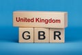 United Kingdom and GBR symbol. Concept words United Kingdom and GBR on wooden blocks. Royalty Free Stock Photo