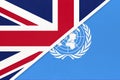 United Kingdom of Great Britain and Ireland national flag vs United Nations or UN official flag Royalty Free Stock Photo