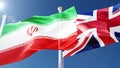 United Kingdom and iran flags waving in the wind against a blue sky. iranian, british national symbols 3d rendering