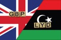 United Kingdom and Libya currencies codes on national flags background