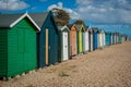 2016 United Kingdom Mersea colorful houses on the coast. Beautiful wide beach with interesting buildings Royalty Free Stock Photo