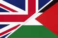 United Kingdom vs Palestine national flag from textile. Relationship between two european and asian countries