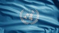 United Nations flag waving in the wind. Close up of UN banner blowing soft silk Royalty Free Stock Photo