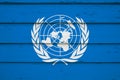 United Nations flag on wood