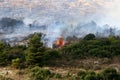 A United Nations helicopter extinguishes a fire on the Israel-Lebanon border Royalty Free Stock Photo