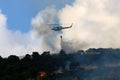 A United Nations helicopter extinguishes a fire on the Israel-Lebanon border