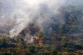 A United Nations helicopter extinguishes a fire on the Israel-Lebanon border Royalty Free Stock Photo