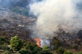 A United Nations helicopter extinguishes a fire on the Israel-Lebanon border Royalty Free Stock Photo