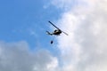 A United Nations helicopter extinguishes a fire on the Israel-Lebanon border Royalty Free Stock Photo