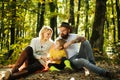 United with nature. Family day concept. Happy family with kid boy relaxing while hiking in forest. Mother father and