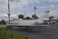 A United Staes Air Force jet is parked in car dealership parking lot Royalty Free Stock Photo