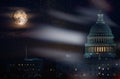 United State Capitol building in the lighth of full super moon in a starry night sky.