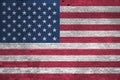 United States of America flag depicted in paint colors on old brick wall. Textured banner on big brick wall masonry background Royalty Free Stock Photo