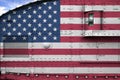 United States of America flag depicted on side part of military armored tank closeup. Army forces conceptual background