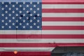 United States of America flag depicted on side part of military armored truck closeup. Army forces conceptual background