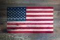 United states of America flag on rustic old wood surface background stars and stripes old glory