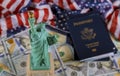 United States of America flag with statue of liberty and US Passport citizens US dollar bills Royalty Free Stock Photo