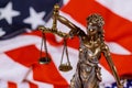 United States of America, statue of Lady Justice with USA flag Royalty Free Stock Photo