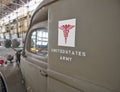 United States Army medical sign detail close up on the side of an antique vintage field hospital truck.