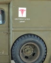 United States Army medical sign detail close up on the side of an antique vintage field hospital truck. Royalty Free Stock Photo