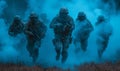 United States Army rangers during the military operation in the smoke and fire Royalty Free Stock Photo