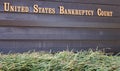 United States Bankruptcy Court Sign with Grass in Foreground Royalty Free Stock Photo