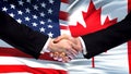 United States and Canada handshake, international friendship, flag background Royalty Free Stock Photo