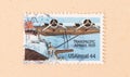 A stamp printed in the USA shows Transpacific Airmail in 1935, circa 1970