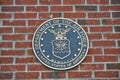 United States Department Of The Air Force Coin on Brick Royalty Free Stock Photo