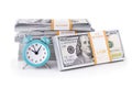 United States dollars package of notes and green clock isolated on white background. Time is money financial business concept. USD Royalty Free Stock Photo