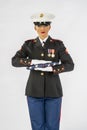 A United States Female Marine Posing In A Military Uniform Royalty Free Stock Photo