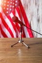 United States flag and microphone.