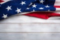 American flag on a white worn wooden background with copy space Royalty Free Stock Photo
